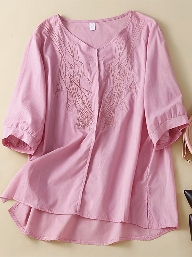 Soft rose blouse styled with a relaxed summer look